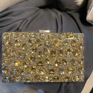 Ladies gold stone encrusted evening bag
